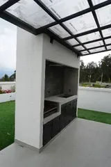 Zona de parrilla cubierta en áreas comunes